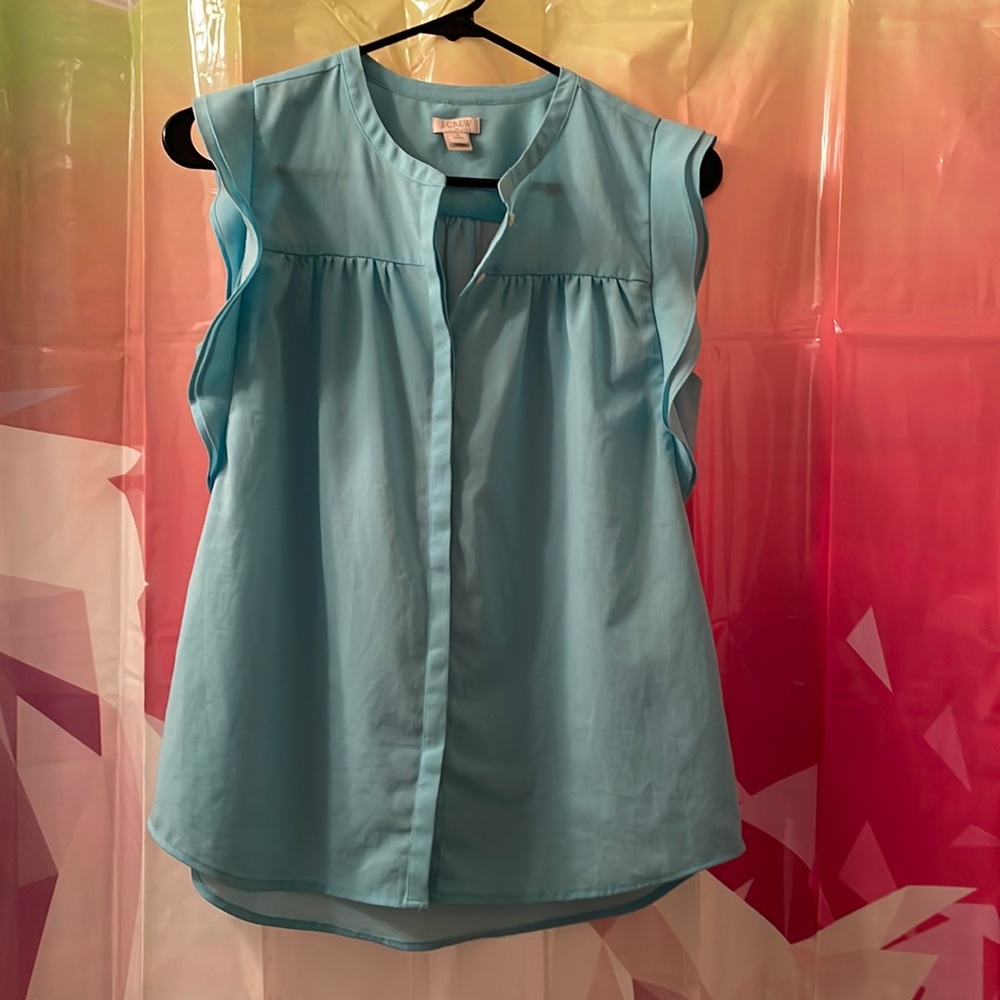 Size 6 petite J. Crew flutter sleeve top in a robin’s egg blue color